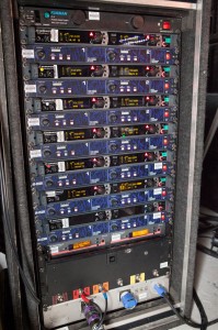 The rack of wireless microphone receivers